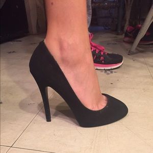 Black suede pumps