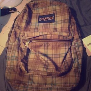 Brown and blue plaid Jansport backpack