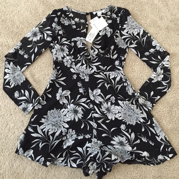 Glamourous Dresses & Skirts - Floral long sleeve romper/jumpsuit sz. XS