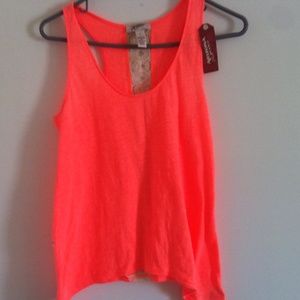 Orange shirt with lace design on the back