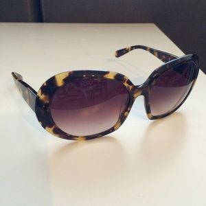 Oliver People sunglasses.