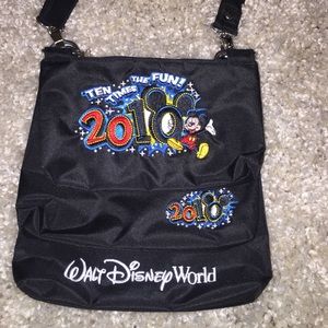 Three attachable embroidered 2010 Disney bags
