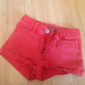 Orange Kendall and Kylie brand shorts from Pacsun.