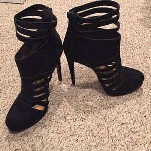 Never worn before, black booties.