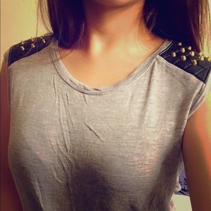 Grey top: leather-studded shoulder design