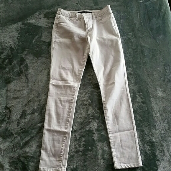 Never worn CK white skinny jeans