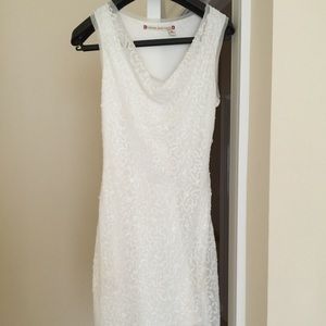 White sleeveless party dress.