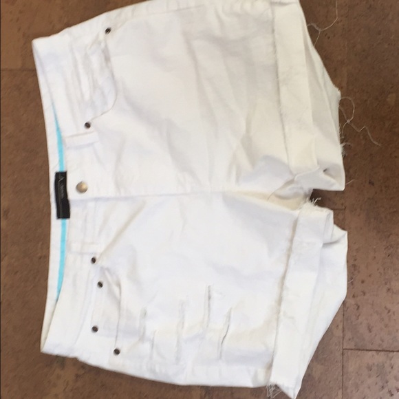 White distressed shorts