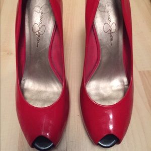 Red patent leather pumps