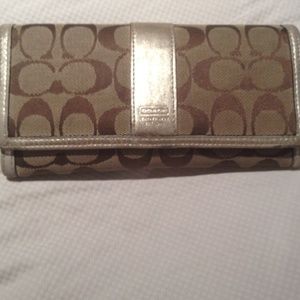 Brown coach billfold wallet