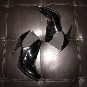 Patent leather Stuart Weitzman booties.