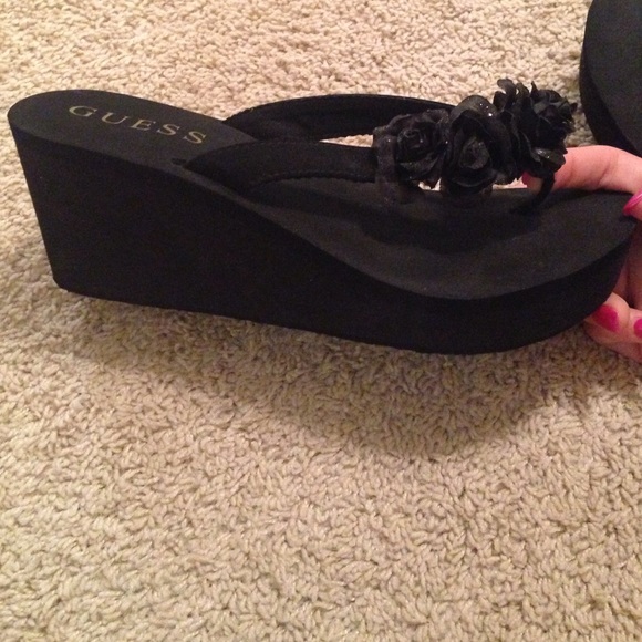 GUESS wedge flip flops