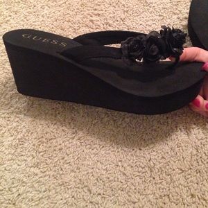 GUESS wedge flip flops