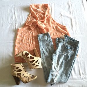 Coral polka dot blouse.