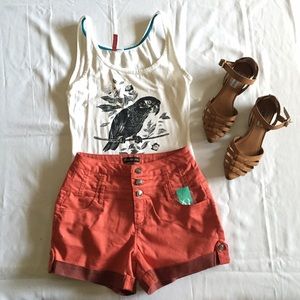 Coral high waisted shorts.
