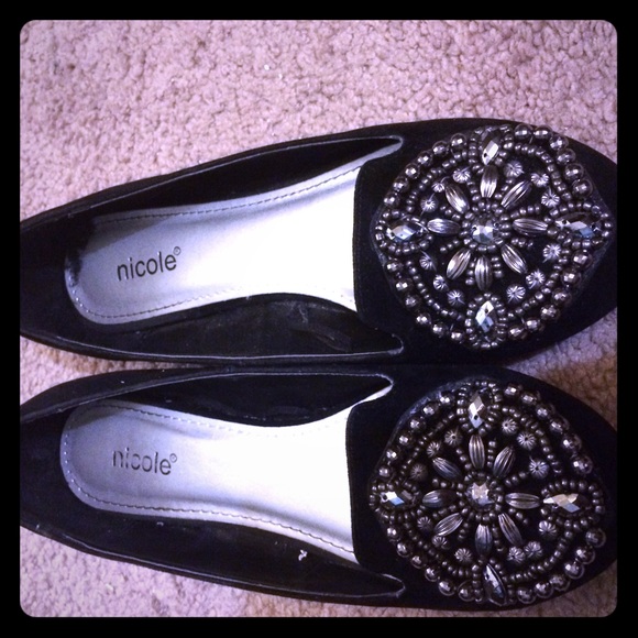 Black flats with silver embellishments
