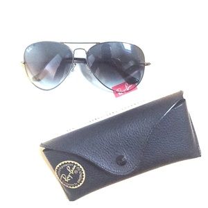 Gunmetal frame gray lense Ray Ban aviators