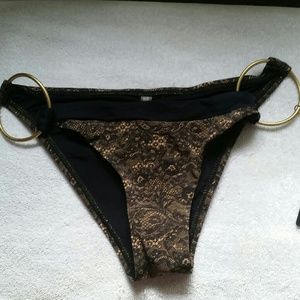 Nude and black lace bottoms