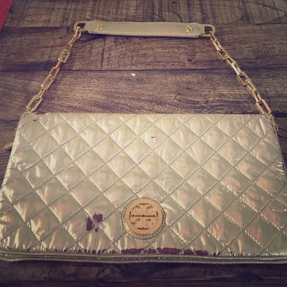 Very loved Gold Tory burch clutch/small purse.