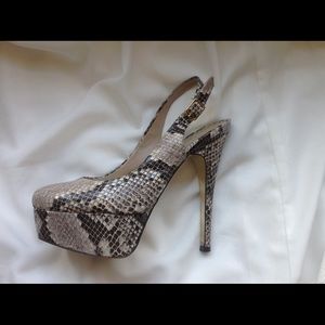 SOLD.  Bebe snake print  size 6 shoes