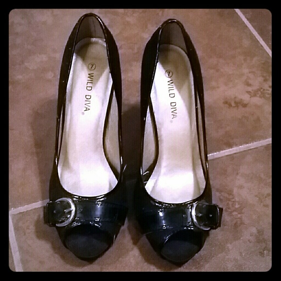 Buckled black heels.....suede material..