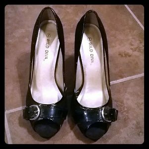 Buckled black heels.....suede material..