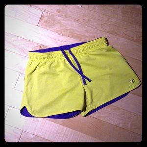 Reversible purple and yellow mesh shorts