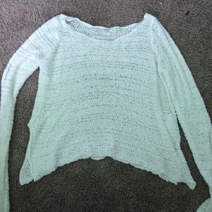 A see through sweater  for the beach