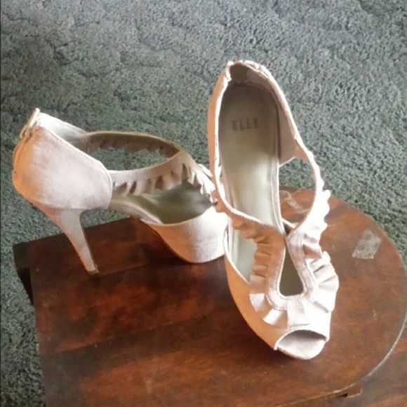 Stylish heels.  Beige/taupe in color.