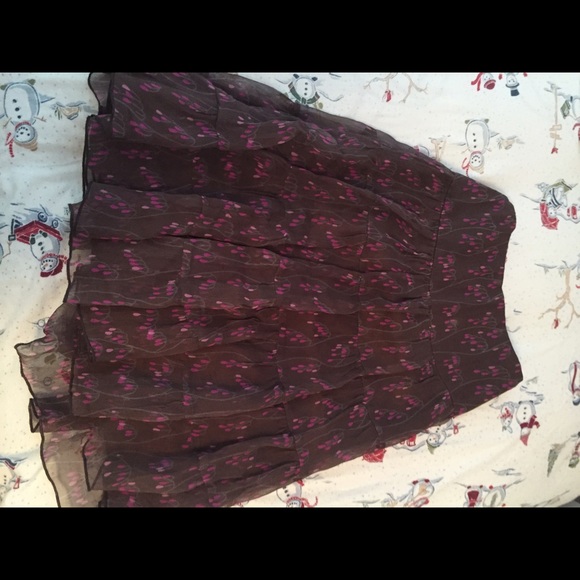 Monkey wear brown flower skirt