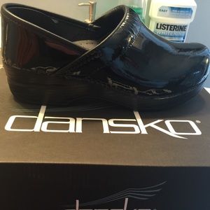 Dansko clogs brand new in the box never worn