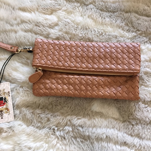 Urban Expressions Handbags - Urban Expressions woven clutch!