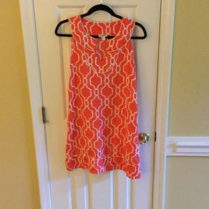 Orange print dress.