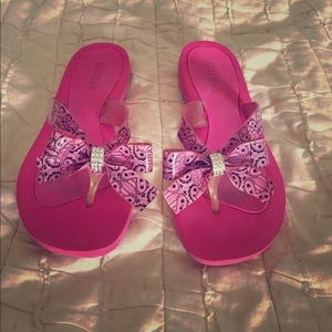 Pink Guess flip flops