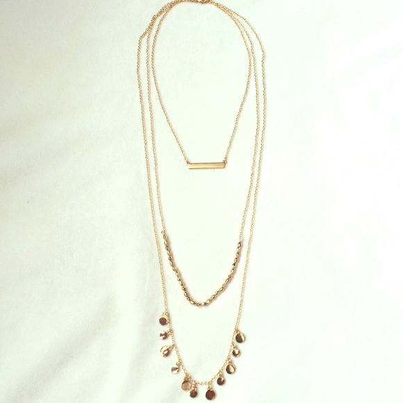 Gorgeous three layered gold plated necklace.