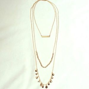 Gorgeous three layered gold plated necklace.