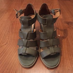 Report Heels, Dark Green With a Gray Undertone.