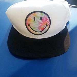 Smiley face snapback