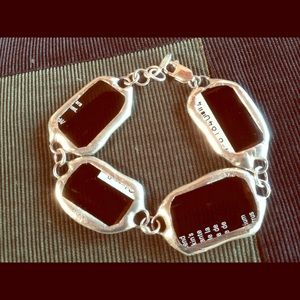 Sterling silver and recycled glass bracelet.