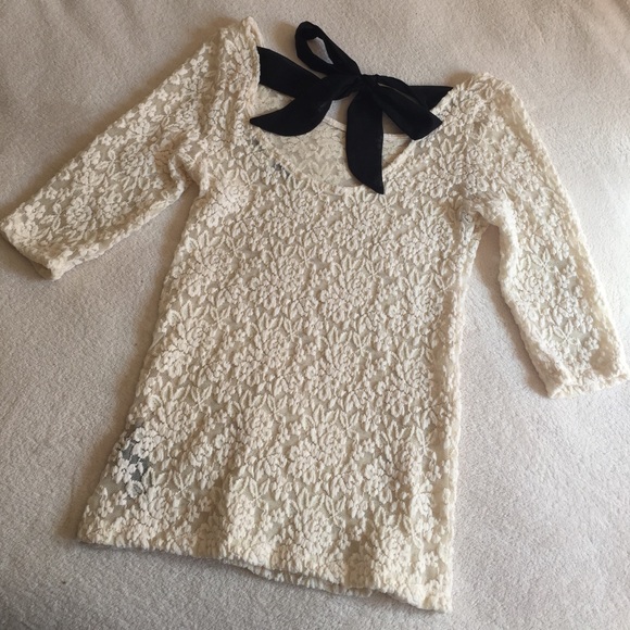 Lace shirt with black bow on back