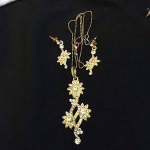 Silver and gold necklace with matching earrings