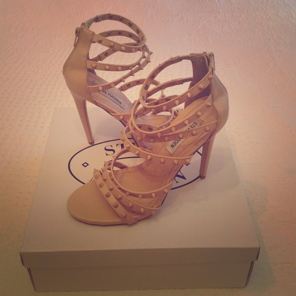 Nude spiked heels