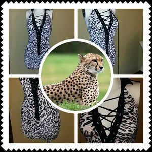 🐆🐅Leopard print lace up dress size small hold