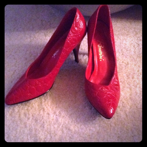 Red kitten heel pumps