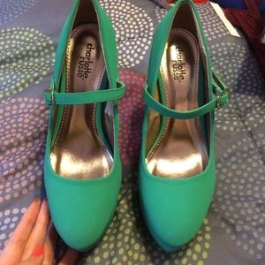 Teal blue pumps