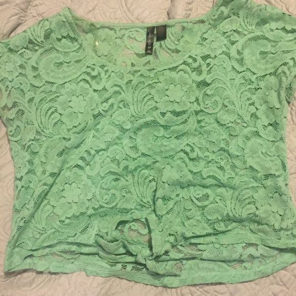 light teal/green shirt