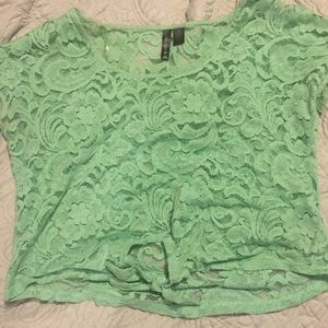 light teal/green shirt