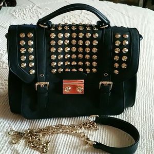 Gold studded handbag