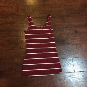Maroon stripped shirt.