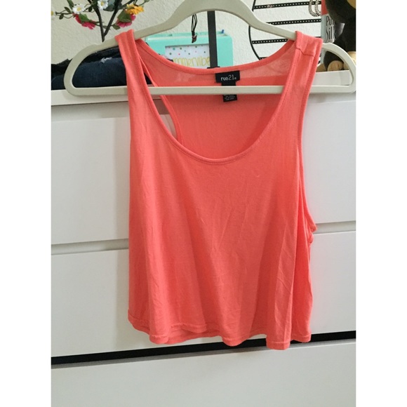 an orange crop top